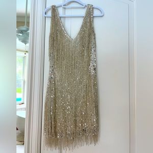 A Sadie silver, hand embellished,V neck, concealed zip, fringe hem, fully lined